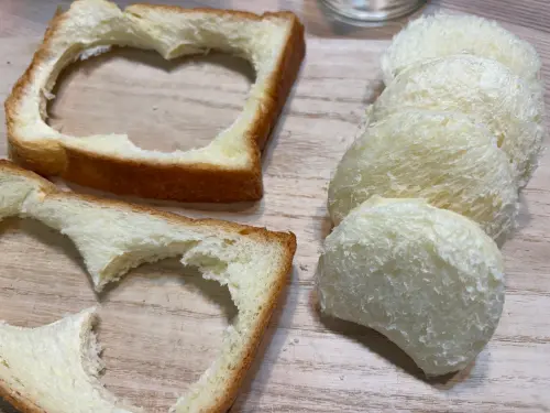 ▲用準備裝蛋糕的玻璃罐壓出一塊塊吐司。（圖／記者徐銘穗攝）