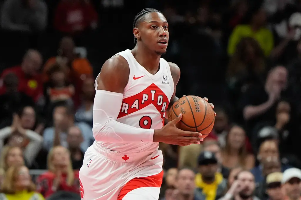 ▲美媒提出了一項涉及獨行俠、暴龍與爵士的「四隊大交易方案」，旨在為勇士換回一名穩定的側翼得分手巴瑞特（RJ Barrett）．他本季場均可得到19.6分。（圖／美聯社／達志影像）