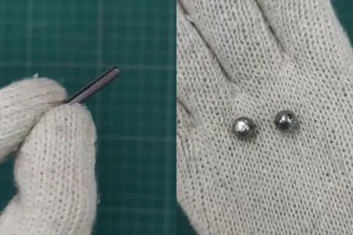 ▲實際割開立可白，長方形版本內部裝有細長版的圓形柱體鋼珠，若是瓶裝版本，裡面則有2顆圓形小鋼珠。（圖／AristoScience YouTube）