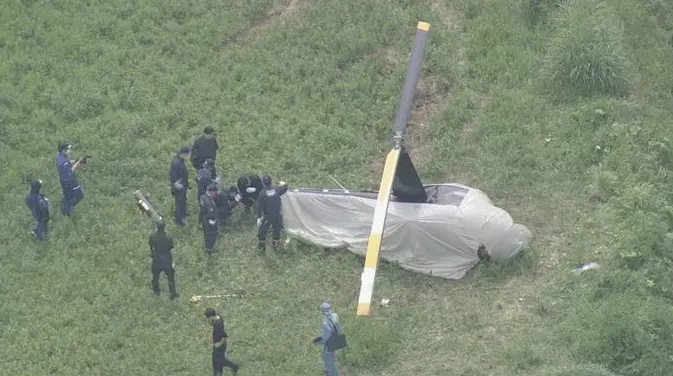    ▲日本熊本阿蘇火山觀光直升機，2024年曾發生引擎在空中故障的事故，直升機緊急迫降，機師及2名外籍乘客骨折受傷。（圖／熊本新聞RKK）  