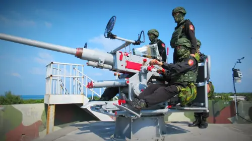 Personnel from Taiwan’s Coast Guard Administration conduct an air-defense gun drill. (Dongsha–Nansha Branch, Coast Guard Administration, Ocean Affairs Council Facebook)
