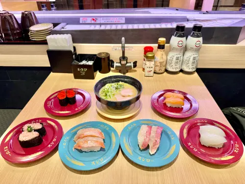 ▲壽司郎微風南山店開幕優惠！40元鮪魚大腹、活鮑魚開吃。（圖／記者蕭涵云攝）