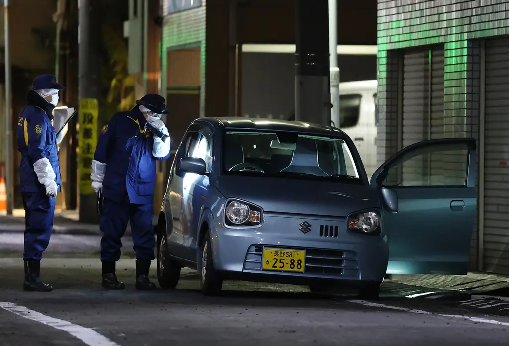 ▲日本東京29日深夜至30日凌晨，連續兩起搶案，4.2億日圓現金遭搶，警方懷疑兩起案件有關聯，正持續追查。（圖／美聯社／達志影像）