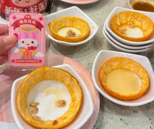 ▲爭鮮盲盒其中一項食物就是橘子，有民眾表示自己想抽筊杯吊飾結果一直開到橘子，甚至有人發現有顧客利用偷看掃光檯面筊杯吊飾，自己吃了好幾顆橘子。（圖/Threads）