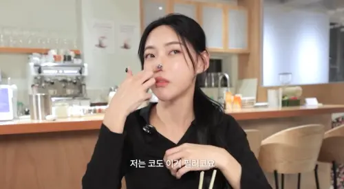 ▲金珉志拍影片否認整形，坦承有打填充跟戴矯正器。（圖／YouTube@kimmingee96）