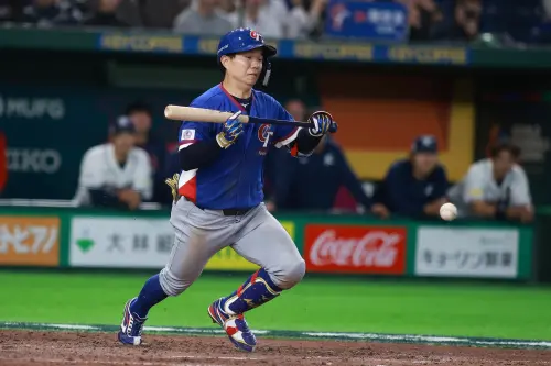 ▲江坤宇適時突擊短打，讓陳傑憲跑回致勝1分。（圖／記者葉政勳攝）