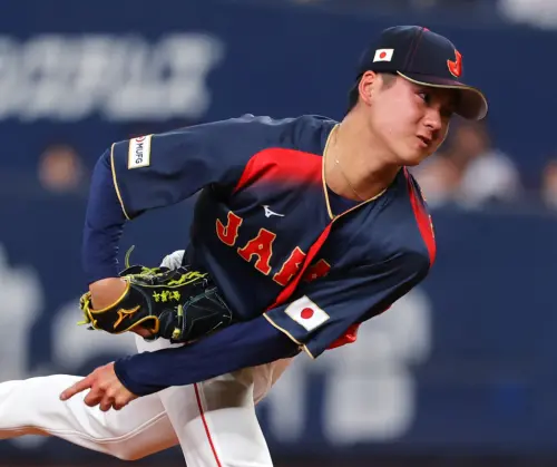 ▲日本隊投手教練吉見一起對金丸評價極高，特別稱讚他的直球和指叉球。（圖／美聯社／達志影像）