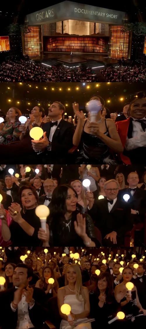 ▲奧斯卡觀眾手上原本都沒東西，後來者EJAE、AUDREY NUNA、REI AMI登台表演〈Golden〉，全場都揮舞金色手燈，李奧納多、葛妮絲派特洛也都被拍到畫面。（圖／翻攝Disney+）