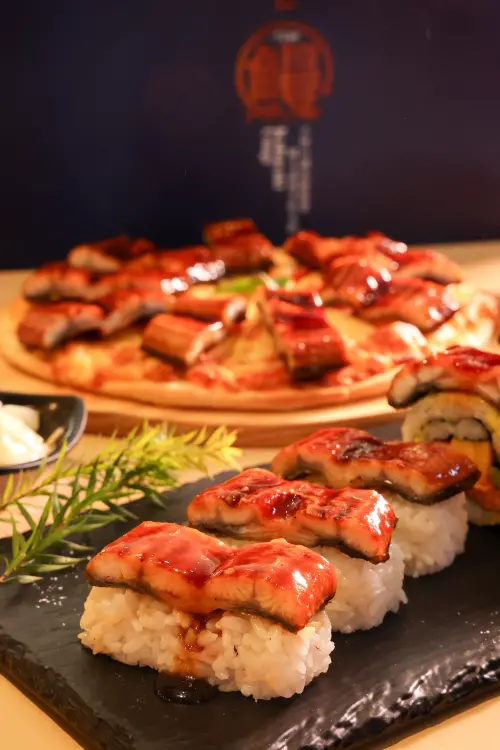 ▲千葉火鍋、享千葉、新千葉、極千葉共同推出鰻魚料理吃到飽，包含鰻魚飯、鰻魚披薩、鰻魚壽司等。（圖／千葉集團提供https://www.cyhotpot.net/）