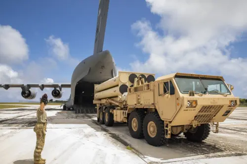A THAAD missile defense launcher is offloaded from a C-17 Globemaster III transport aircraft. (US Army)