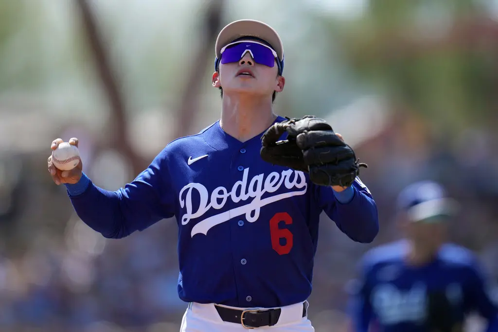 ▲MLB洛杉磯道奇今（23）日正式宣布，將金慧成下放至小聯盟3A，由於他熱身打擊率突破4成、竟輸給打擊率僅1成的競爭對手弗里蘭，讓韓媒再度炸鍋，直言道奇球團根本太過分。（圖／美聯社／達志影像）