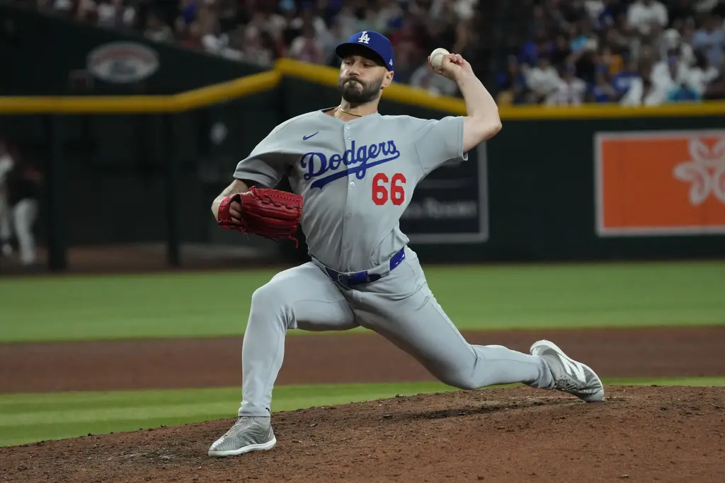 ▲洛杉磯後援投手史考特（Tanner Scott）在今（23）日道奇對上洛杉磯天使的春訓熱身賽中，僅投0.1局就狂失4分，賽後引發道奇球迷集體崩潰。（圖／美聯社／達志影像）