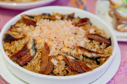 ▲內門宋江大宴菜色還包含蒲燒鰻魚干貝米糕（圖／高雄市觀光局提供）