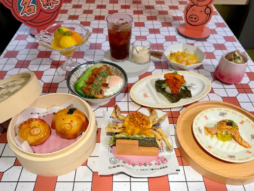 ▲点爭鮮x點點心「玉子鮮蝦豬仔流沙包」領軍，推薦必吃整隻「避風塘香蟹握手卷」。（圖／記者蕭涵云攝）