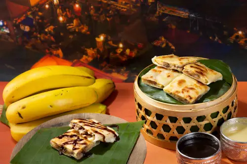 ▲香蕉煎餅外層酥香，還要加上巧克力醬、煉乳提味。（圖／晶華酒店提供）