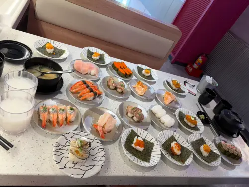 ▲点爭鮮買一送一活動便宜又大碗！整桌800元吃飽，熱門的壽司口味通通都有買一送一，爽吃赤蝦、蟹膏、牡蠣盛。（圖/記者張嘉哲攝）