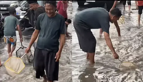 印尼日惹暴雨魚池潰堤　滿街活魚亂竄居民徒手撈魚塞爆馬路