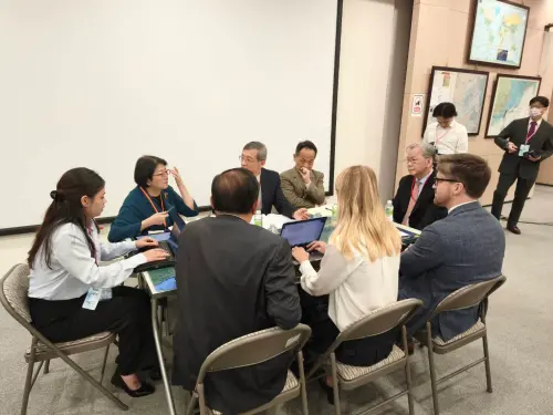 Experts participating in the 2026 TTX conduct an economic security simulation. (TCN)