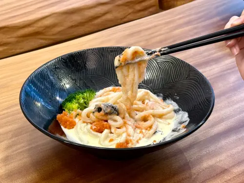 ▲「明太子白醬烏龍麵」，鹹香誘人。（圖／記者蕭涵云攝）
