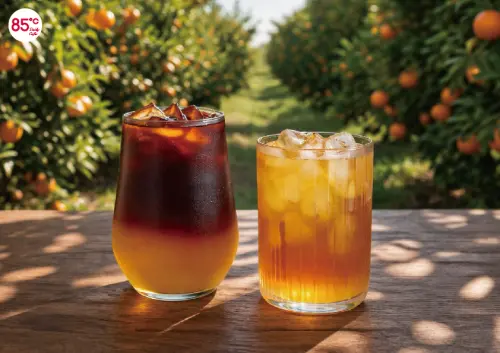 ▲85度C「椪柑冰美式」大杯85元、「椪柑翡翠」大杯60元。（圖／85度C提供）