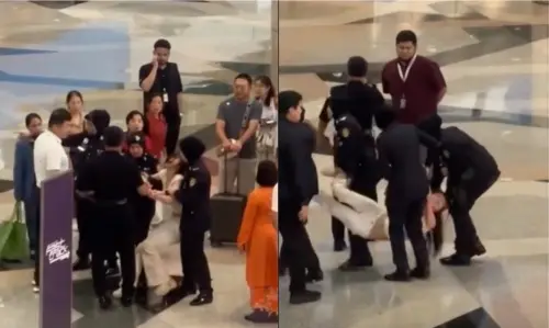 沒錢買機票回家！中國女子硬闖吉隆坡機場　情緒失控遭4警抬走