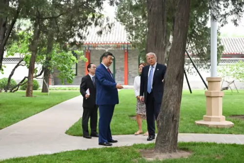Chinese President Xi Jinping guides US President Donald Trump on a tour of Zhongnanhai. (Foreign Ministry PRC)