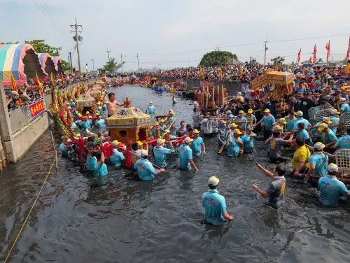 Hundreds of palanquins charge into the sea in Taiwan’s 200-year-old folk ritual