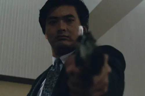 ▲周潤發把《英雄本色》中的小馬哥從配角演成主角，成為這系列片集中最令人印象深刻的人物。（圖／翻攝自IMDb）