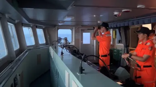 CGA officers monitor Chinese Coast Guard vessel 3501 from the bridge of the patrol ship Taichung. (CGA)