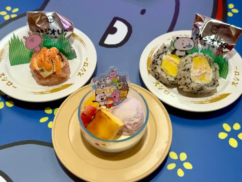 ▲壽司郎西村優志聯名餐點，左起：「炙燒明太子鮪魚萩餅」、「彩虹交響曲」甜點、「芝麻玉子壽司捲」。（圖／記者蕭涵云攝）