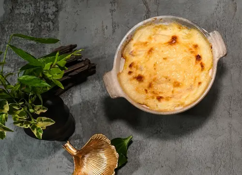 ▲「蟹肉焗菜膽」是台北福華大飯店珍珠坊招牌港點。（圖／台中福華提供）