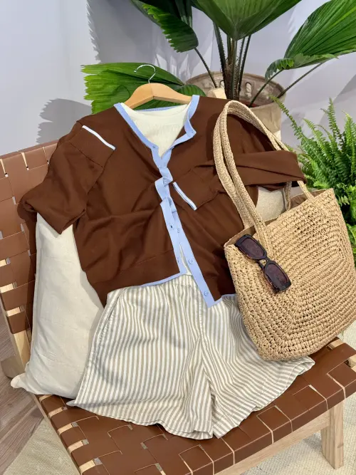 ▲社群人氣新品「防曬拼色圓領開襟外套」室外遮陽、室內冷氣房也很實穿。（圖／記者蕭涵云攝）