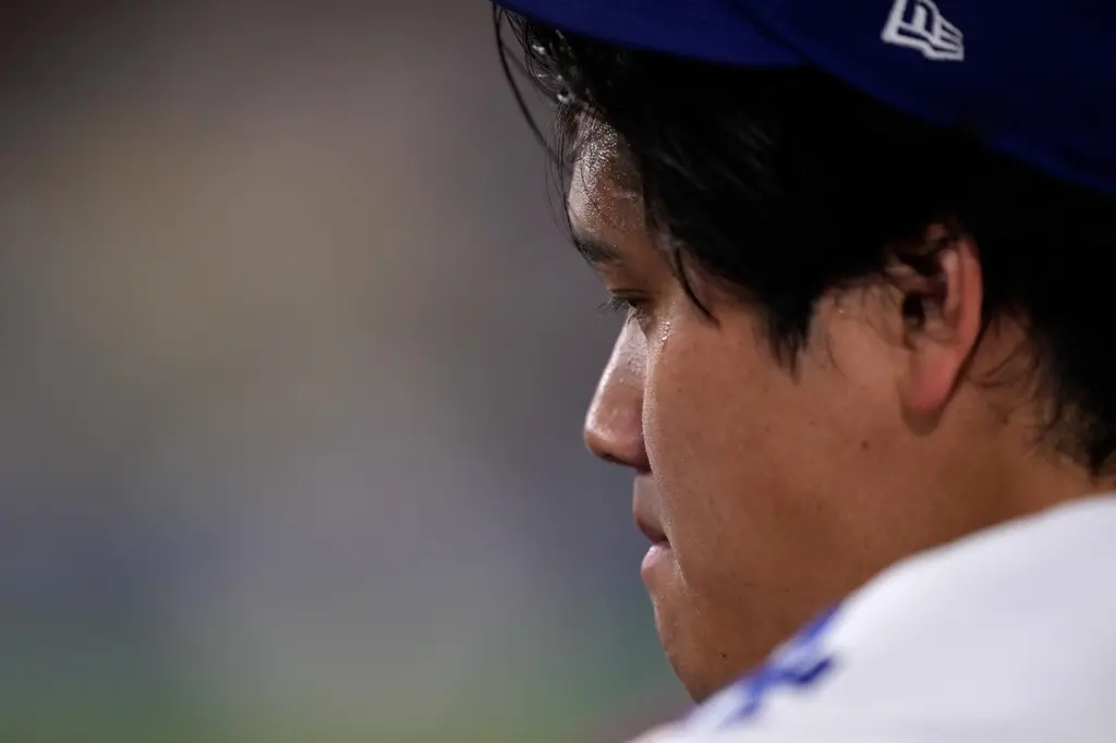 ▲大谷將接受「抽出左膝積水」的治療，此舉是為了避免傷勢惡化的預防性措施，以確保他在下半季及10月季後賽能保持絕對健康。（圖／美聯社／達志影像）