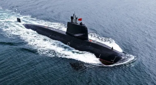 A Chinese PLA Navy submarine heads toward a designated sea area during a maritime training exercise. (China Military Online)