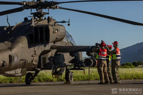 ROC Army ground crew prepare an AH-64E Apache attack helicopter for a training exercise. (MNA)