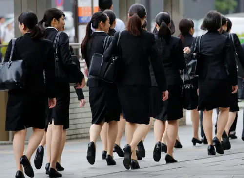 ▲日本女性上班族工作穿搭。（圖／路透社／達志影像）