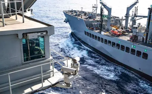 The USS George Washington conducts an underway replenishment alongside a supply ship. (Facebook USS George Washington)