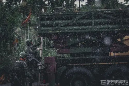 An ROC Army Thunder-2000 multiple launch rocket system unit conducts a drill in the rain during the Han Kuang Exercise. (MNA)