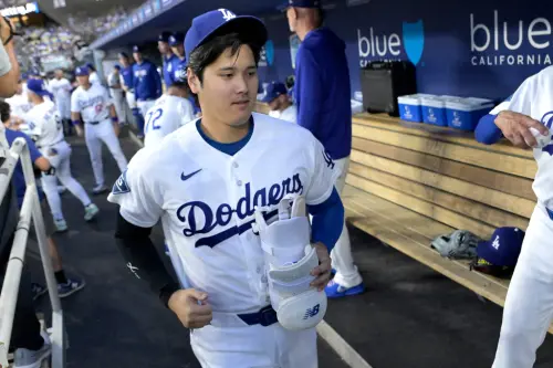 ▲道奇日籍球星大谷翔平因左膝與右二頭肌不適，球團正評估是否將他放入傷兵名單。（圖／美聯社／達志影像）