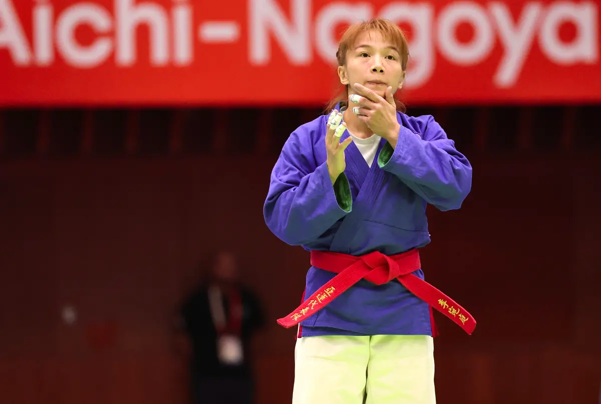 ▲克拉術一姐李宛庭今（27）日於名古屋亞運奪下銀牌，這是她挑戰3屆亞運後，終於拿到首面獎牌，賽後他要把這面努力將近10年的獎牌，獻給2018年過世的母親，也道出一段遺憾又讓人心碎的故事。（圖／特派記者朱永強攝）