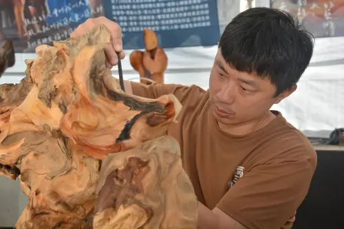 A live woodcarving demonstration at the 2024 Sanyi Wood Sculpture Festival. (Sanyi Wood Sculpture Association Facebook)