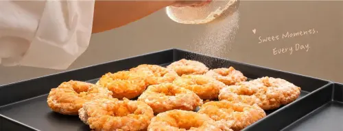 ▲鮮奶脆皮甜甜圈最大特點，就是外皮帶獨特酥脆口感。（圖／取自捲髮奶奶鮮奶脆皮甜甜圈臉書）