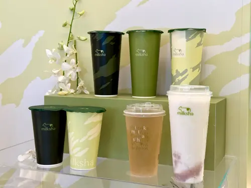 ▲迷客夏全新紙杯，2款中杯、3款大杯設計。（圖／記者蕭涵云攝）