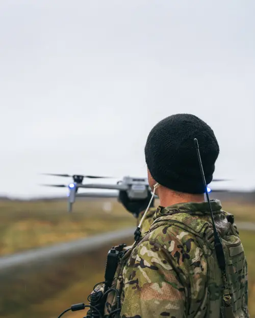 A soldier with the US Army’s 11th Airborne Division trains with a small unmanned aircraft system at a range. (US DVIDS)
